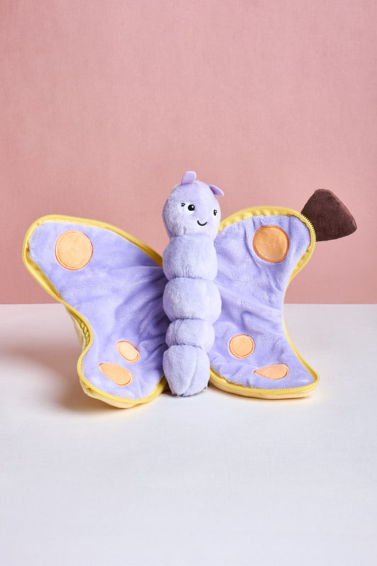 Plush toy butterfly with a pink background